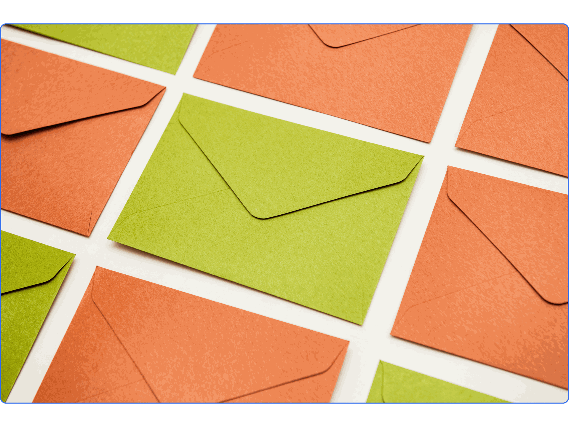 A green envelope surrounded by orange envelopes arranged on a white background in a diagonal pattern.