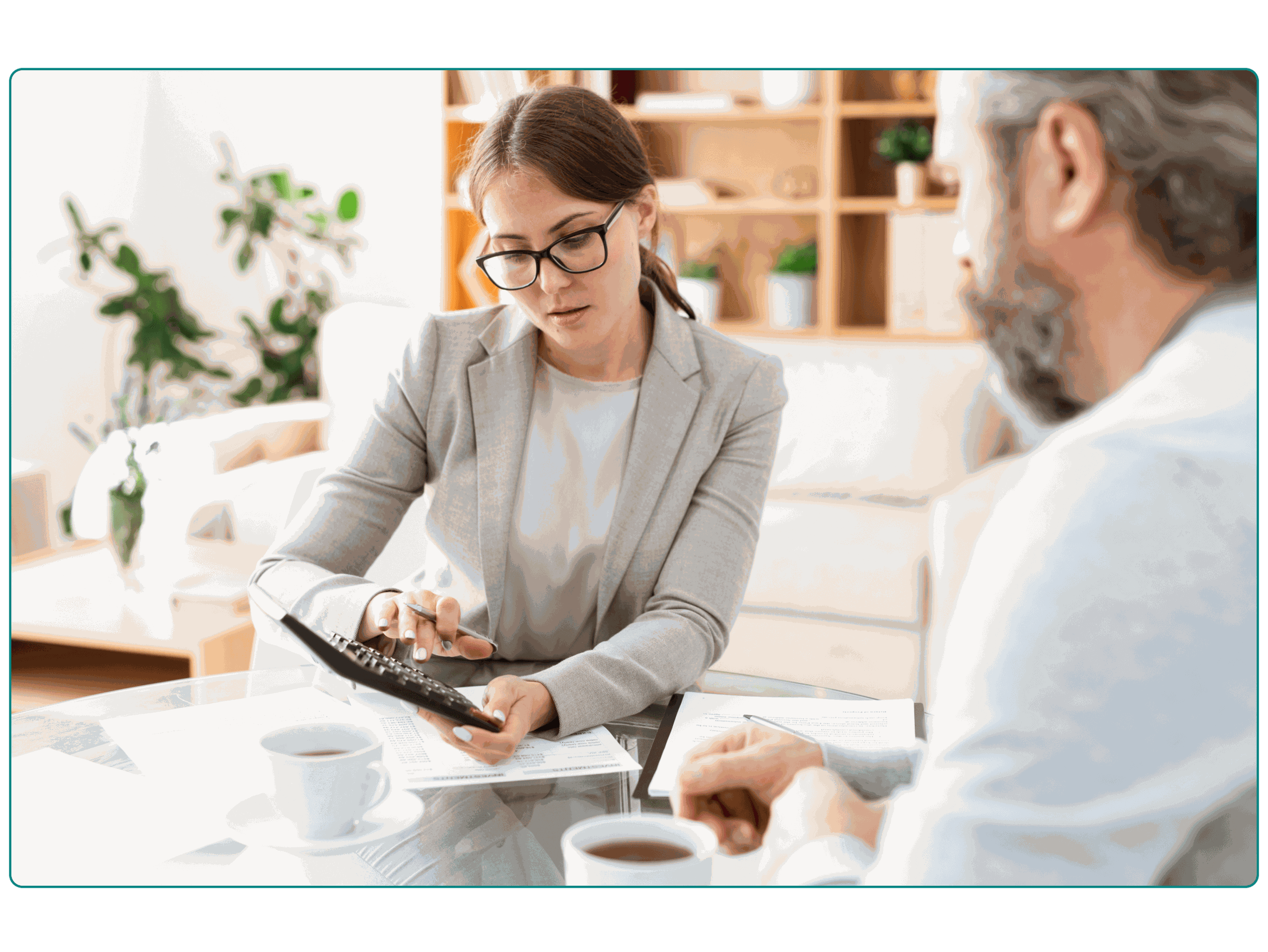 A woman calculating increased revenue with her colleague.