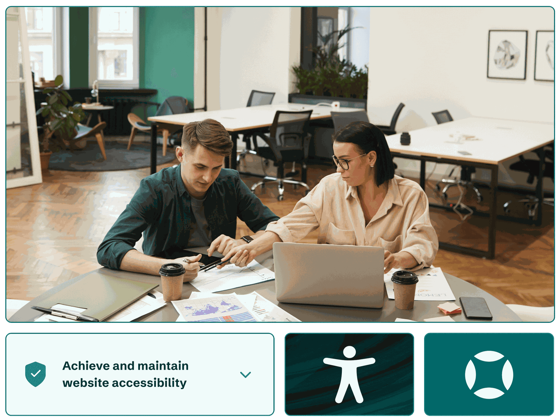 Two colleagues working at a computer helping customers achieve and maintain website accessibility.