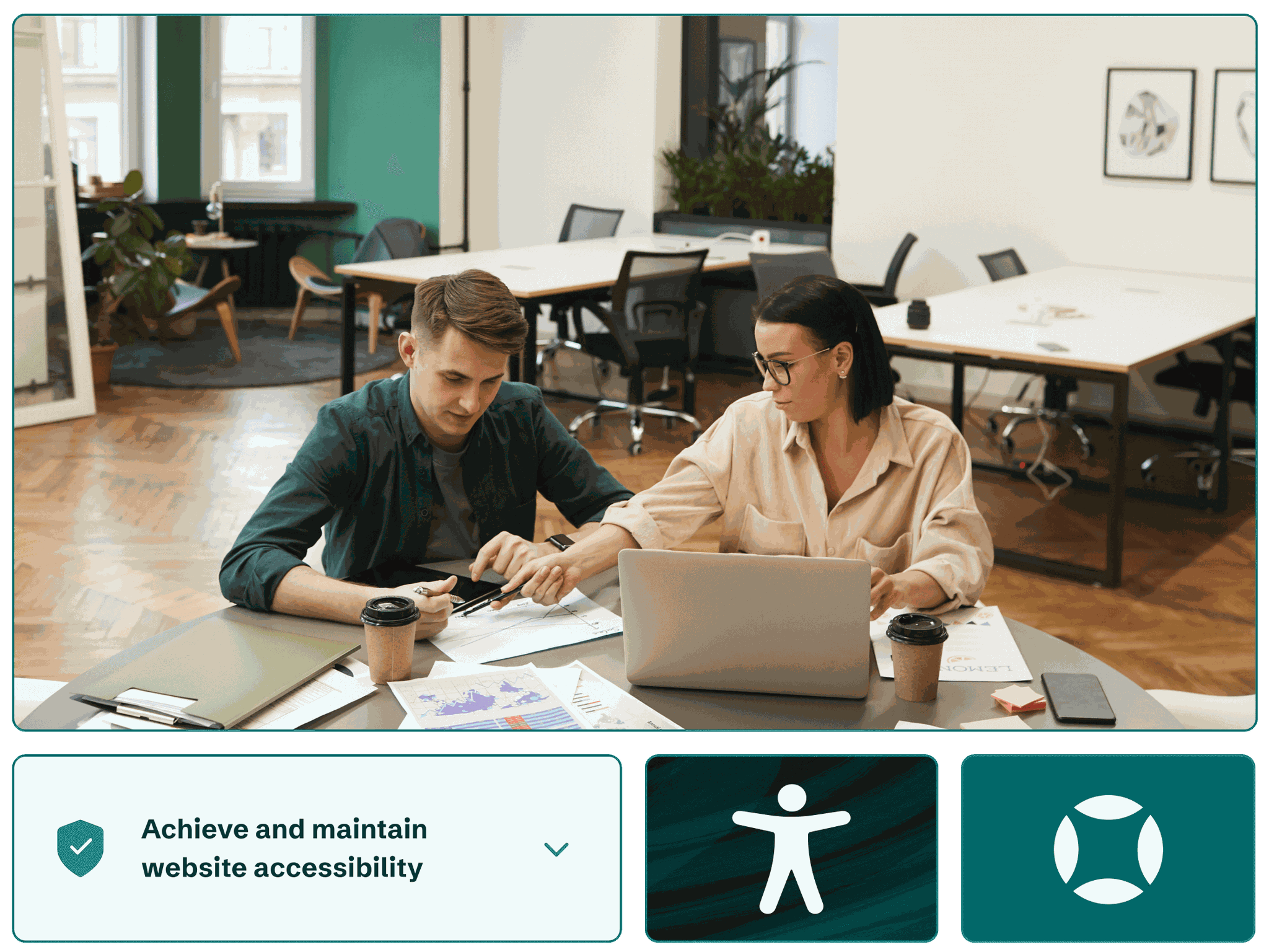 Two colleagues working at a computer helping customers achieve and maintain website accessibility.
