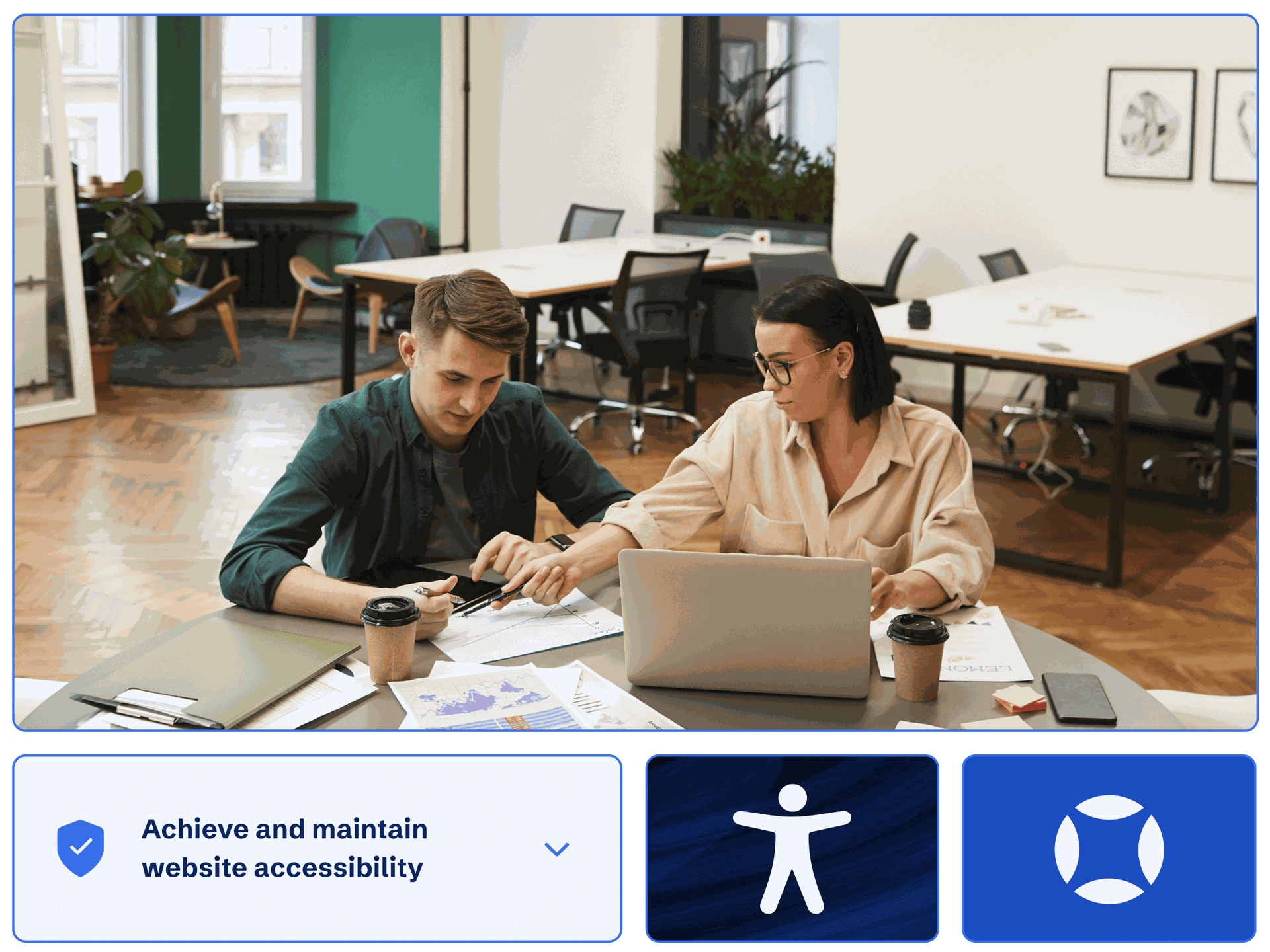 Two colleagues working at a computer helping customers achieve and maintain website accessibility.