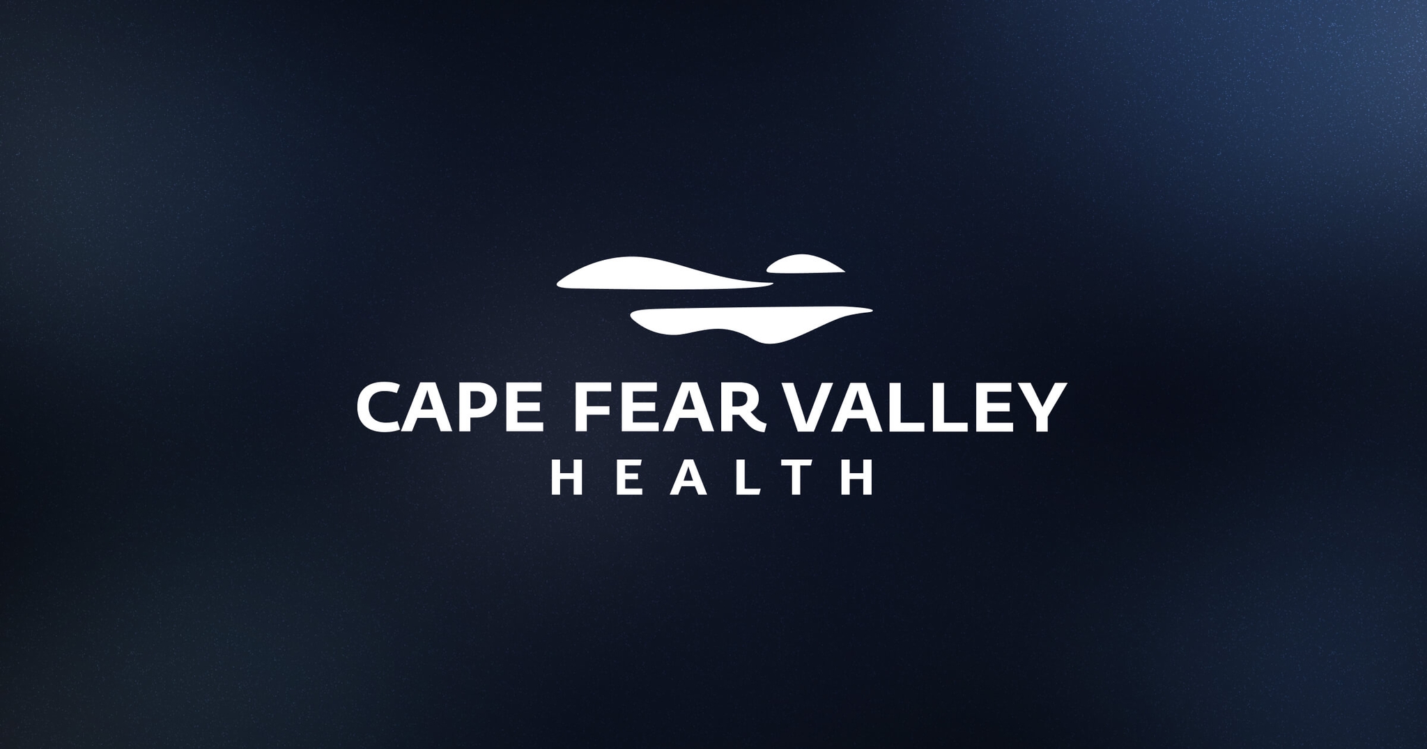 Cape Fear Valley Health logo with white text and abstract wave design on a dark blue background.