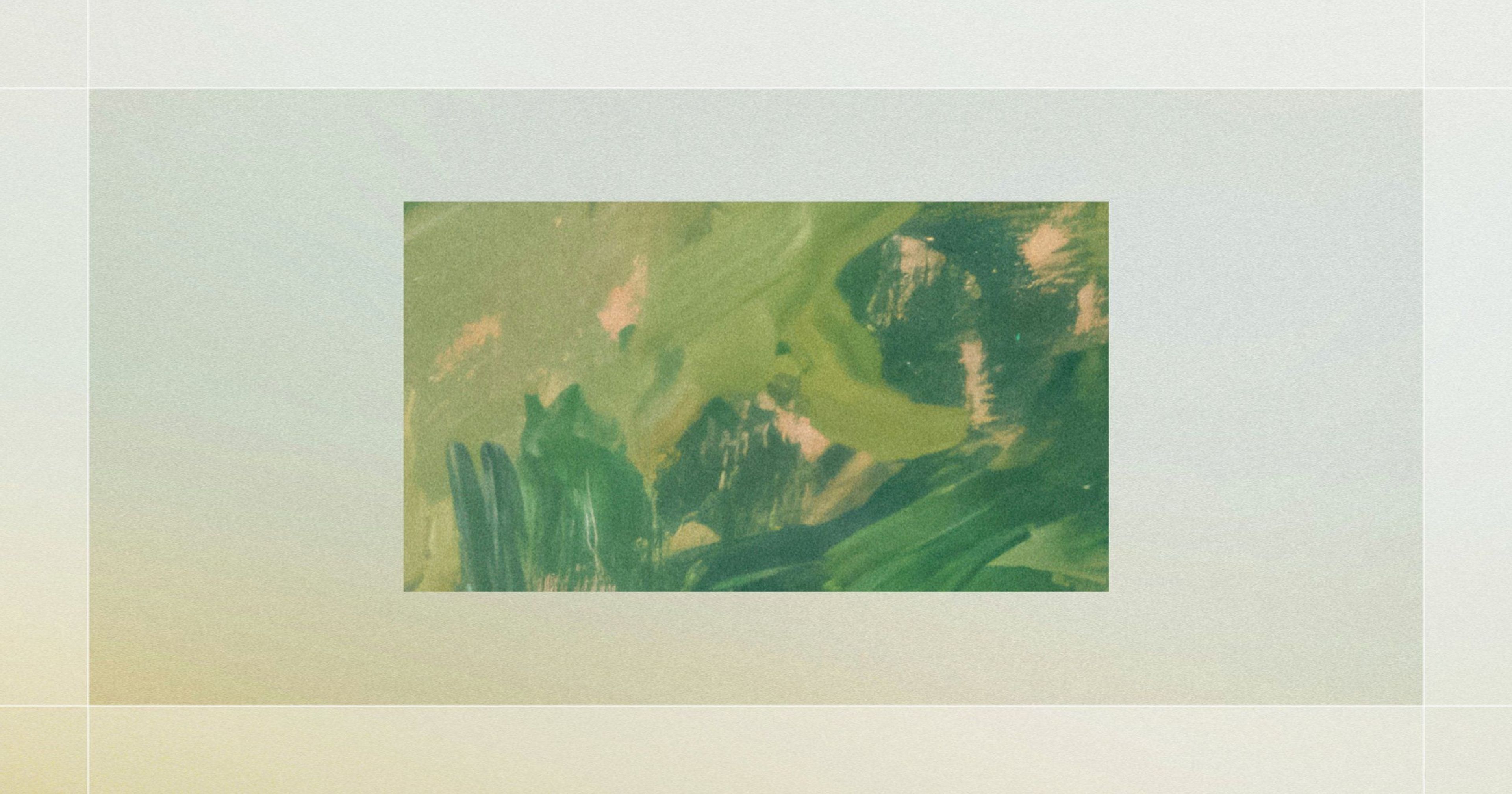 An abstract painting with shades of green and hints of peach on a canvas with a light gray border.