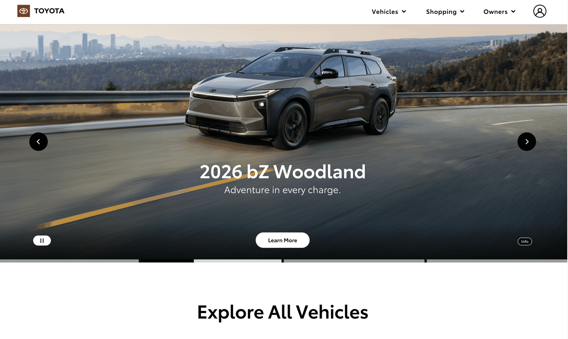 A grey toyota SUV that is part of a home page carousel. The play-pause functionality button is set to play.