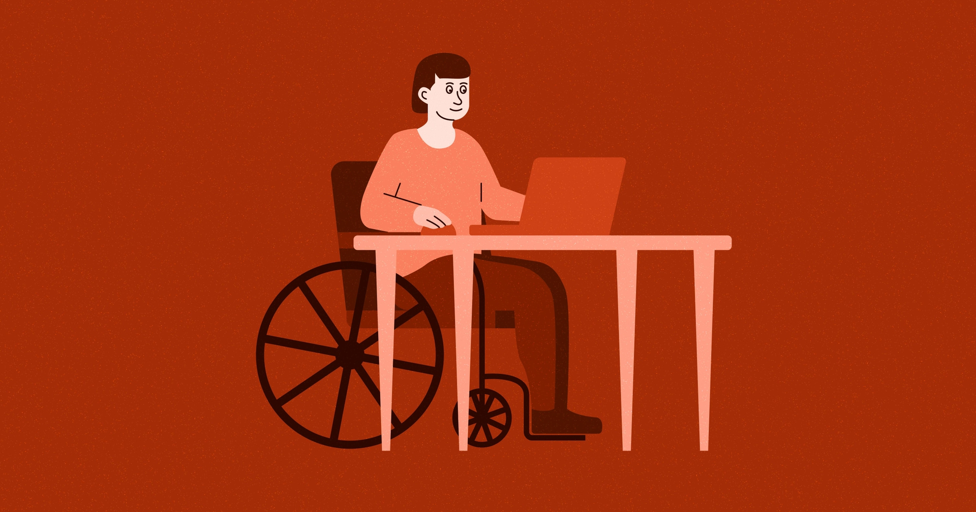 Person in a wheelchair sitting at a desk and looking at a laptop.