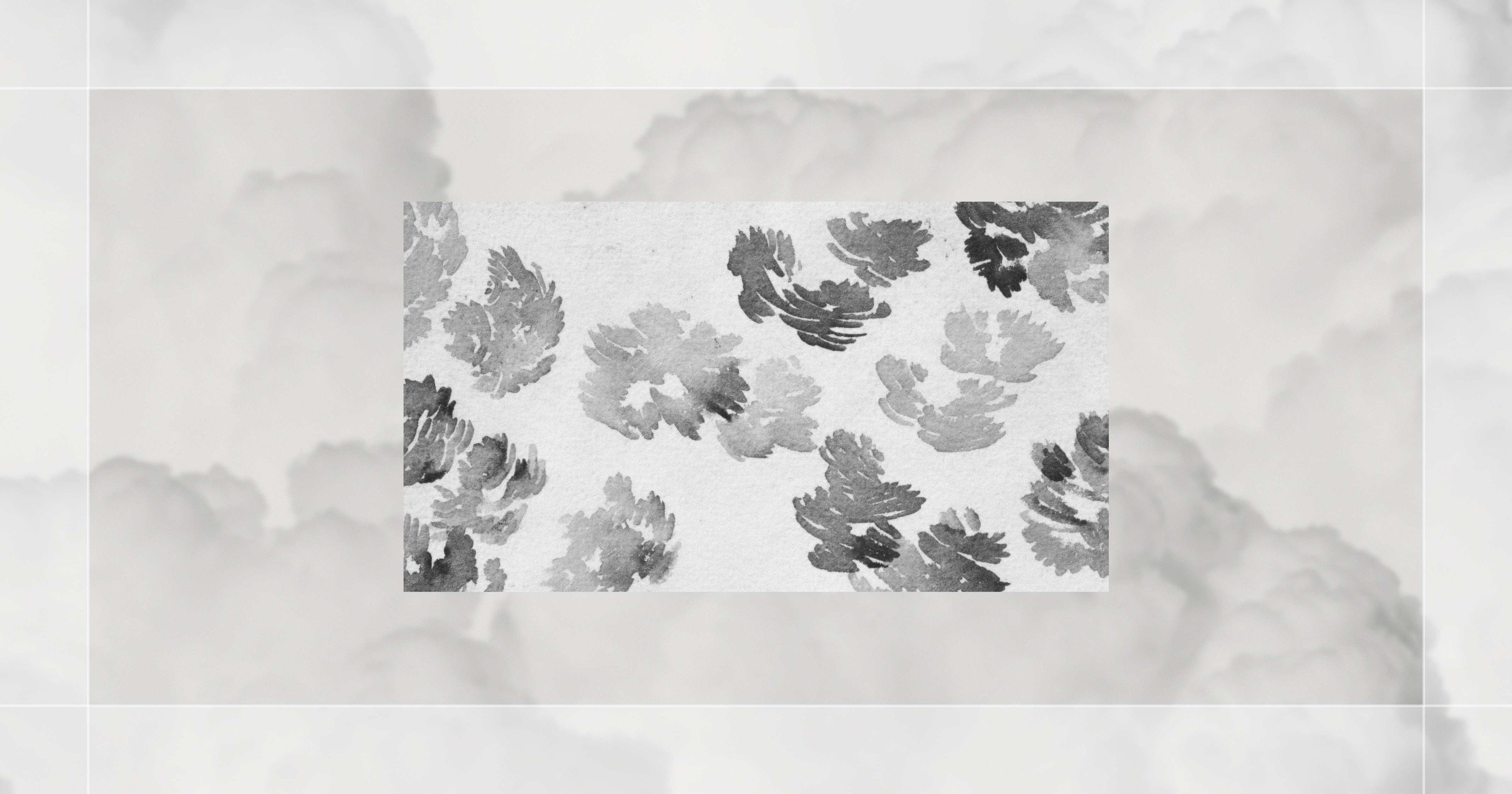 Abstract black and white watercolor floral pattern with a cloudy background.